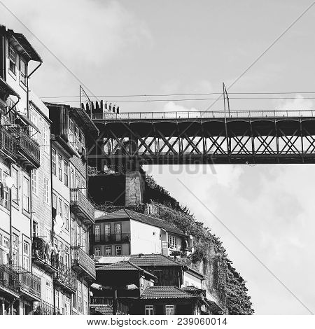Bridge Built By Eiffel On The Bacground Of The Historical Centre Of The City Of Porto With Tradition
