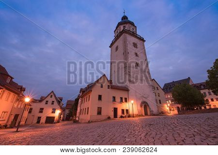 Altenburg Germany -may 2018: The Chrurch Of Nikolai In Front Of A Cloudy Blue Summer Sky Wide Angle