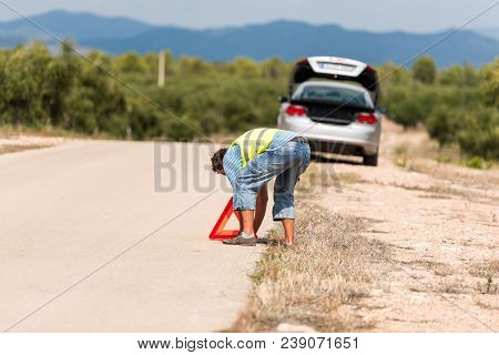 The Car Broke Down On The Road. Emergency Sign Close-up On The Road, Tarragona, Catalunya, Spain