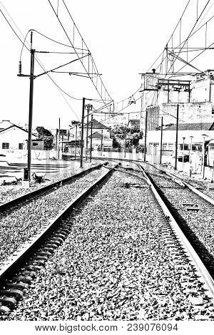 Railroad On The Shore Of Atlantic Ocean In Portugal. Electrified Railway Near Nature Park Of Ria For