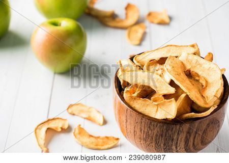 Dried Apples In A Wooden Bowl Ripe Green Apples On The Table