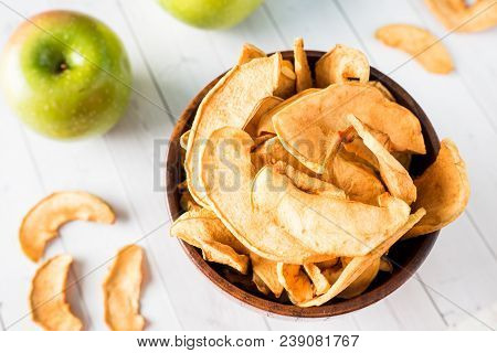 Dried Apples In A Wooden Bowl Ripe Green Apples On The Table