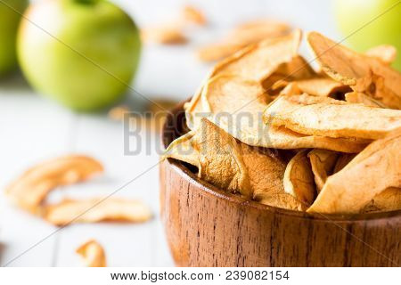Dried Apples In A Wooden Bowl Ripe Green Apples On The Table