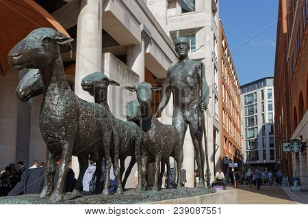 London, United Kingdom, April 20, 2018 : The Man And His Lambs In The Paternoster Square