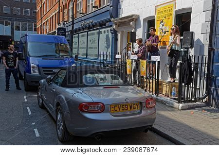 London, Great Britain, April 21, 2018 : An Impromptu Gig In Soho In A Street Of Soho.