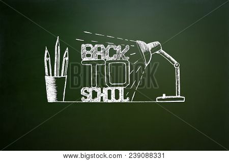 Back To School. School Icons On Chalkboard In The Form Of A Frame