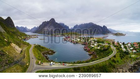 Aerial View Of Mount Olstind And Reine Fishing Village On Lofoten Islands In Norway.