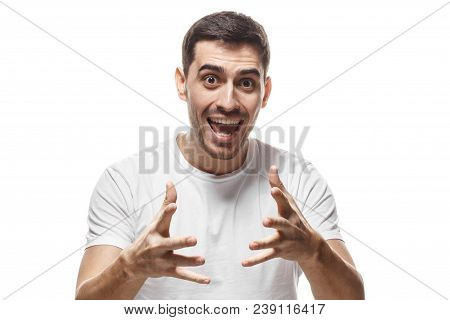 Horizontal Portrait Of Young European Male Isolated On White Background Wearing Casual T-shirt Looki