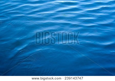 Ripple Blue Water Texture With Reflections Of The Sky