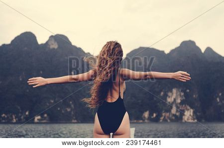 Beautiful woman posing at sunset