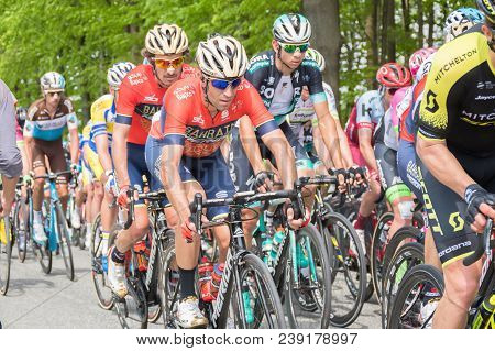 Vielsalm- Belgium, April 22, 2018: Cyclists Compete Riding Rapid And Pass The Nature Forest In Sunny