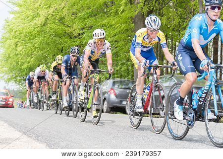 Vielsalm- Belgium, April 22, 2018: Cyclists Compete Riding Rapid And Pass The Nature Forest In Sunny