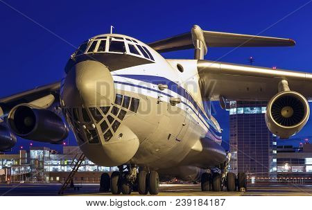 Large Russian Cargo Plane Il-76 Close-up Of The Night In The Airport
