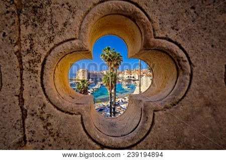 Dubrovnik Harbor View From Ploce Gate Through Stone Carved Detail, Dalamtia Region Of Croatia