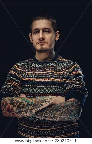 Portrait Of Smiling Male In Colorful Sweater And Tattooed Arms.