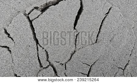 Bad Asphalt Road With White Line. Crack In Grey Asphalt.