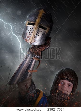 Lightning Strikes A Knight On Battlefield. Knight With Sword In Battlefield.