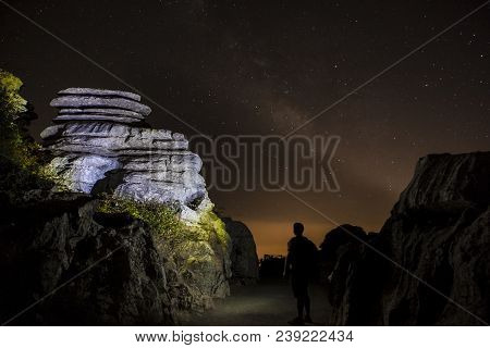 Starry Sky Background At Night In El Torcal De Antequera Natural Park, Andalusia, Spain. Some Of Lig
