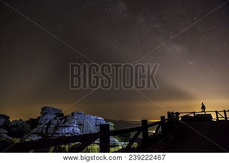 Starry Sky Background At Night In El Torcal De Antequera Natural Park, Andalusia, Spain. Some Of Lig