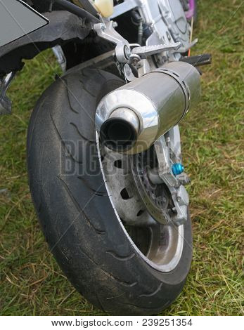 Powerful Motorcycle Exhaust Pipes  Rear Closeup Photo