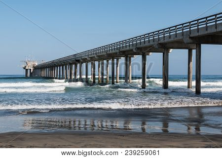 Beach At La Jolla Shores In San Diego, California With Concrete Research Pier.