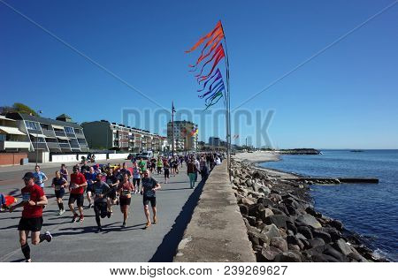 Helsingborg, Sweden - 05 May, 2018: People running competition along the coast of Oresund strait. IFK Helsingborg City Run Springtime performs the 38th edition