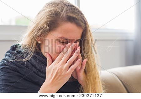 Great Concept Of Allergy, Rhinitis, Cough. Young Blonde Woman Coughing.