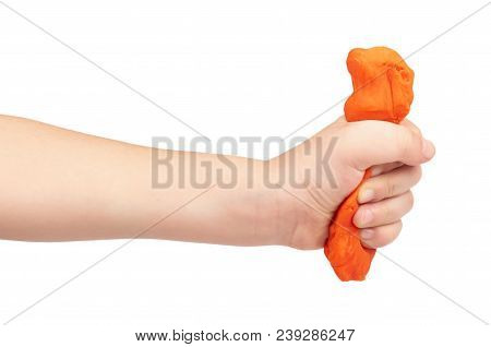 Orange Plasticine Bar With Kid Hand, Isolated On White Background.