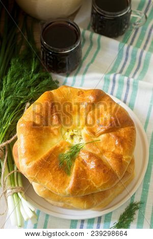 Traditional Homemade Romanian And Moldovan Pies - Placinta, Served With Wine. Rustic Style, Selectiv