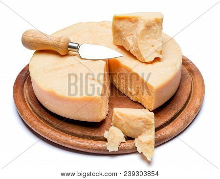Whole Round Head And Pieces Of Parmesan Or Parmigiano Hard Cheese