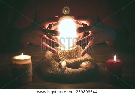 Crystal Ball And Fortune Teller Hands. Divination Concept. The Spiritual Seance. Future Reading.