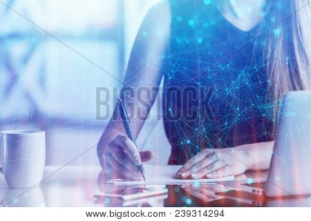 Female Hands Working At Worklace With Abstract Polygonal Interface And Laptop. Future And Innovation