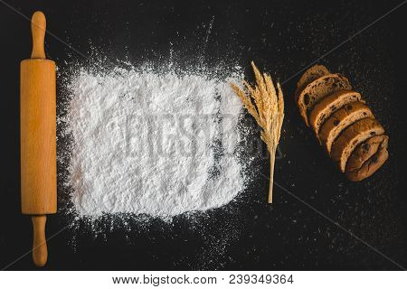 Top View Of Baking Concept , Rolliing With Baking Powder And Bread With