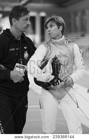 ST. PETERSBURG, RUSSIA - MAY 4, 2018: Peter Joppich, Germany and his coach in first competition day of Fencing World Cup Saint-Petersburg Foil. This annual tournament is hold in 44th time