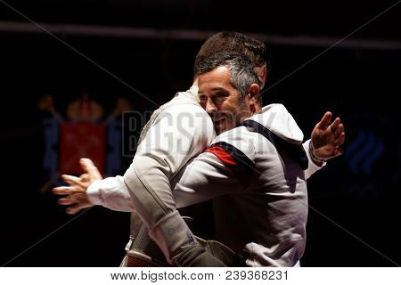 ST. PETERSBURG, RUSSIA - MAY 5, 2018: Maxime Pauty, France accepts congratulations after winning the final of Fencing World Cup Saint-Petersburg Foil. This annual tournament is hold in 44th time