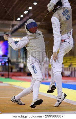 ST. PETERSBURG, RUSSIA - MAY 4, 2018: Nikita Sokolov, Russia vs Luis Klein, Germany in first competition day of Fencing World Cup Saint-Petersburg Foil. This annual tournament is hold in 44th time