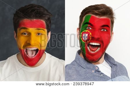 Emotional Soccer Fans With Painted Spain And Portugal Flags On Faces. Confrontation Of Football Team