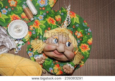 Creativity Needlework Rag Doll On Grey Background With Copyspace. Russian Folk Crafts