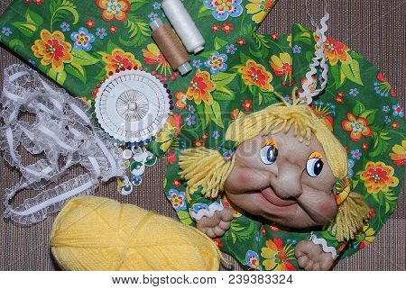 Creativity Needlework Rag Doll On Grey Background With Copyspace. Russian Folk Crafts