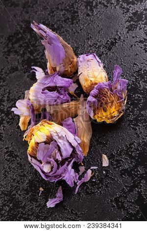 Dried Blue Lotus Flower On Black Background.