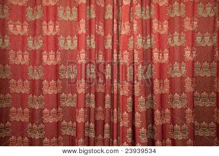 Red patterned curtains.