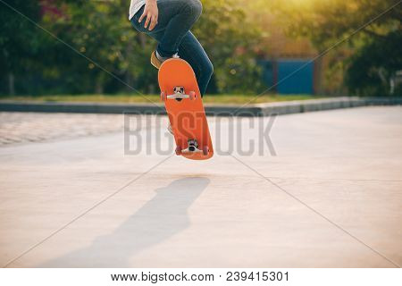 Closeup Of Skateboarder Sakteboarding On Parking Lot