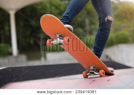 One Young Skateboarder Sakteboarding On Skatepark Ramp