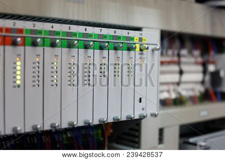Industrial Automation System With Programmable Controllers. Selective Focus.