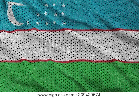 Uzbekistan Flag Printed On A Polyester Nylon Sportswear Mesh Fabric With Some Folds