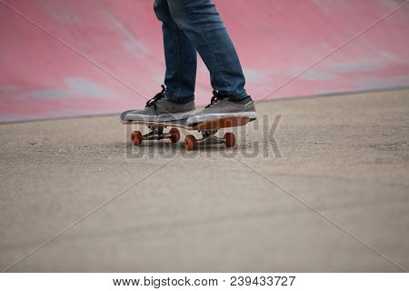 Closeup Of One Skateboarder Sakteboarding On Skatepark