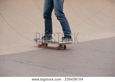 Closeup Of One Skateboarder Sakteboarding On Skatepark