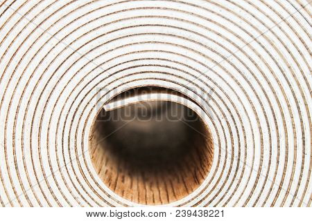 Roll Of Linoleum On A White Background
