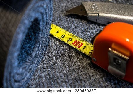 Gray Carpet Roll Is Frozen And Sliced