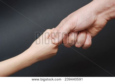 Father Giving Hand To A Child. Parental Relationshipp, Closeup. Isoalted